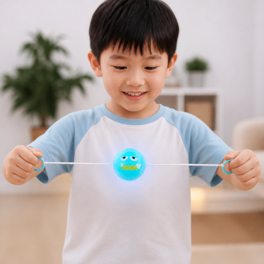 Light-Up Whistling Pull String Spinning Ball Toy
